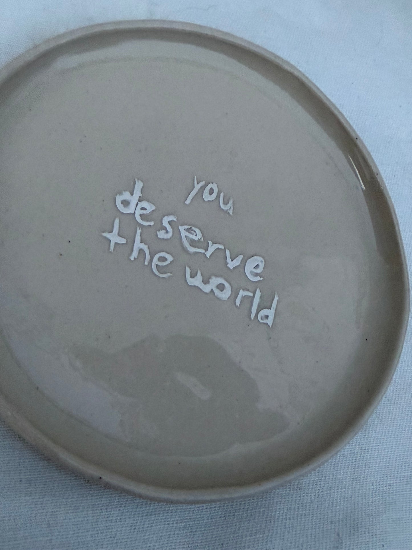 You deserve the world app plate