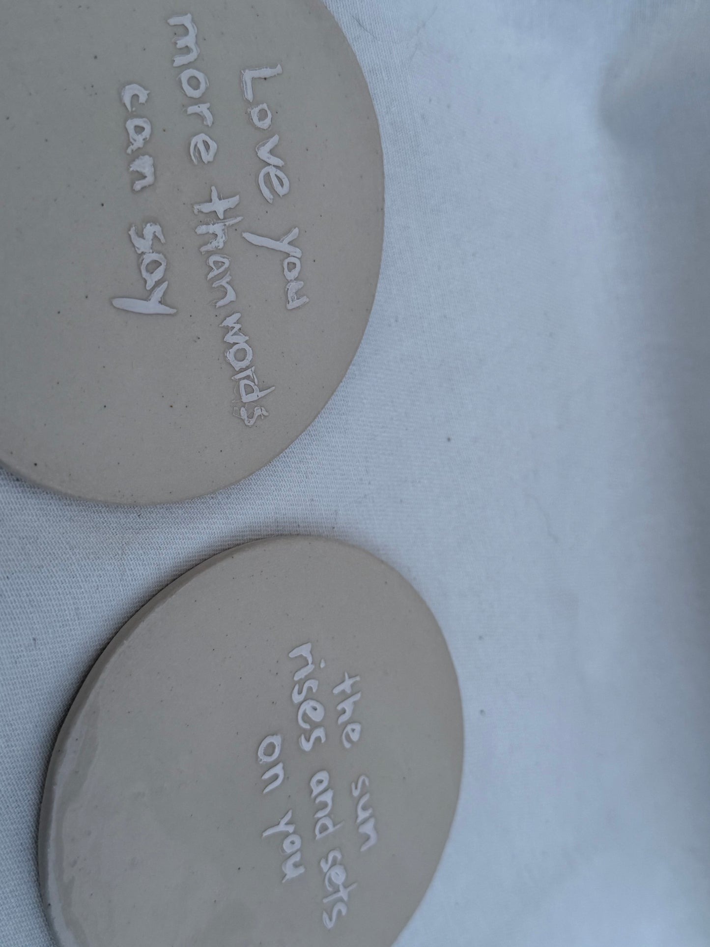 Silver coasters/wall hangings