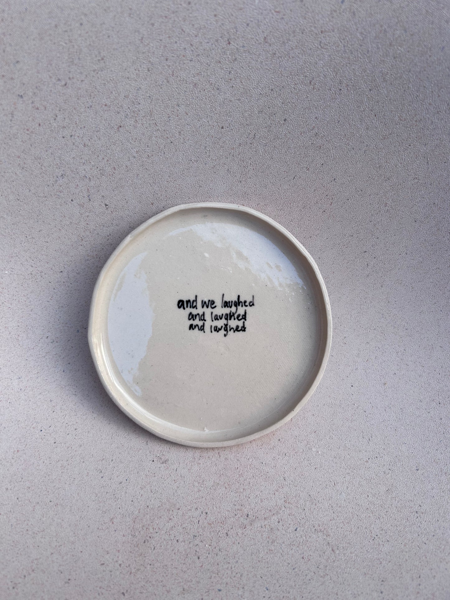 ‘& we laughed’ App Plate