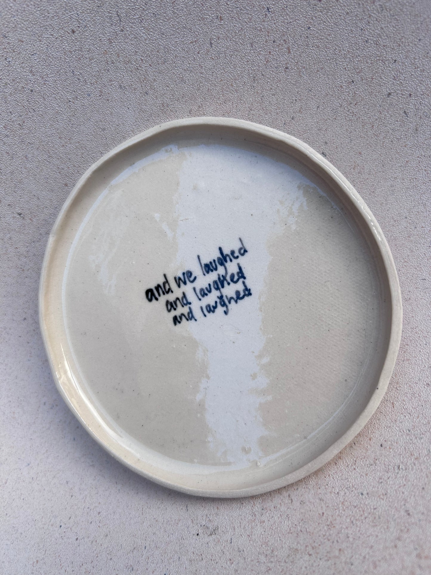 ‘& we laughed’ App Plate